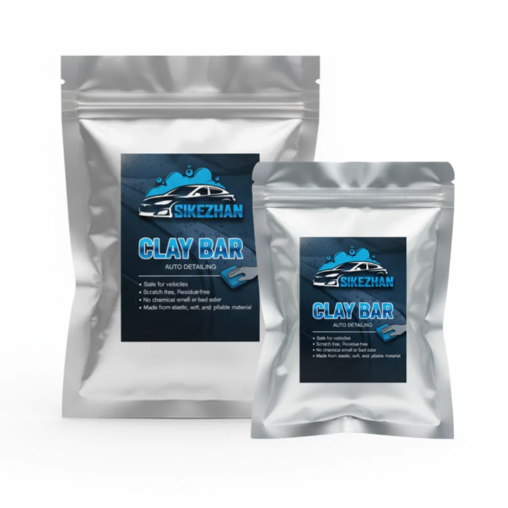 Two resealable pouches of clay bar automotive detailing product with blue and black labeling