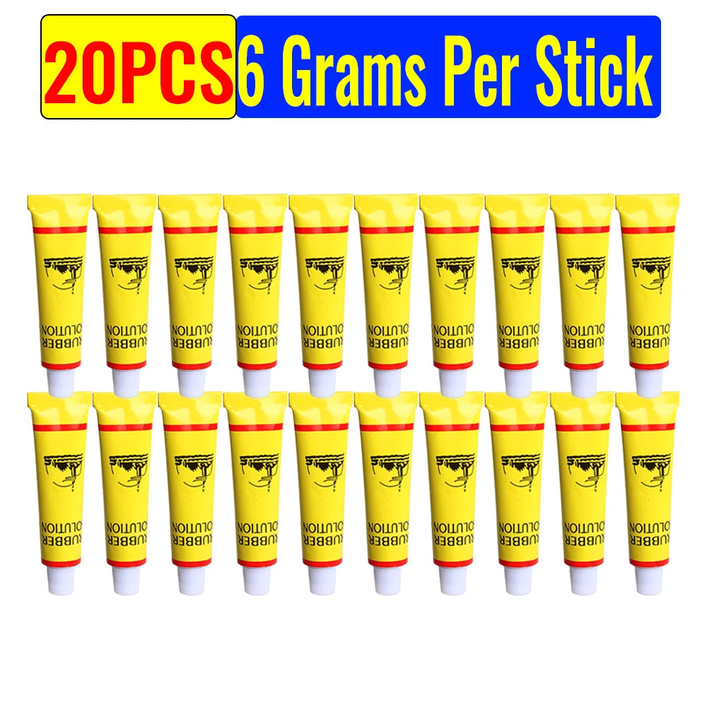 Une rangée de tubes jaunes, étiquetés 20 pièces, 6 grammes par bâton pour kit de colle de réparation de pneus.
