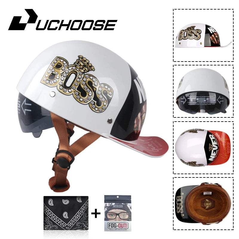 A white motorcycle helmet with gold Boss graphics and a brown strap, shown alongside accessories.