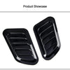 Black decorative air intake vent for a car hood