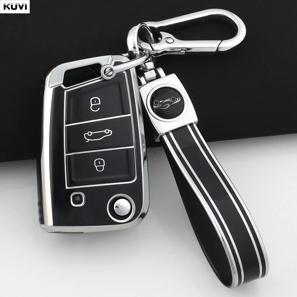 Silberner TPU-Schutz für VW/Skoda Schlüssel mit schwarzem Griff und Metallclip.