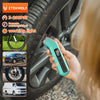A hand holds a green digital tire pressure gauge against a car tire, demonstrating its use.