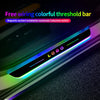 A colorful threshold bar with a logo is installed on a car door sill, featuring magnetic suction and an automatic induction s