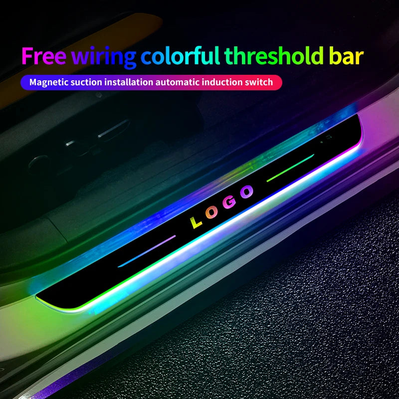 A colorful threshold bar with a logo is installed on a car door sill, featuring magnetic suction and an automatic induction s