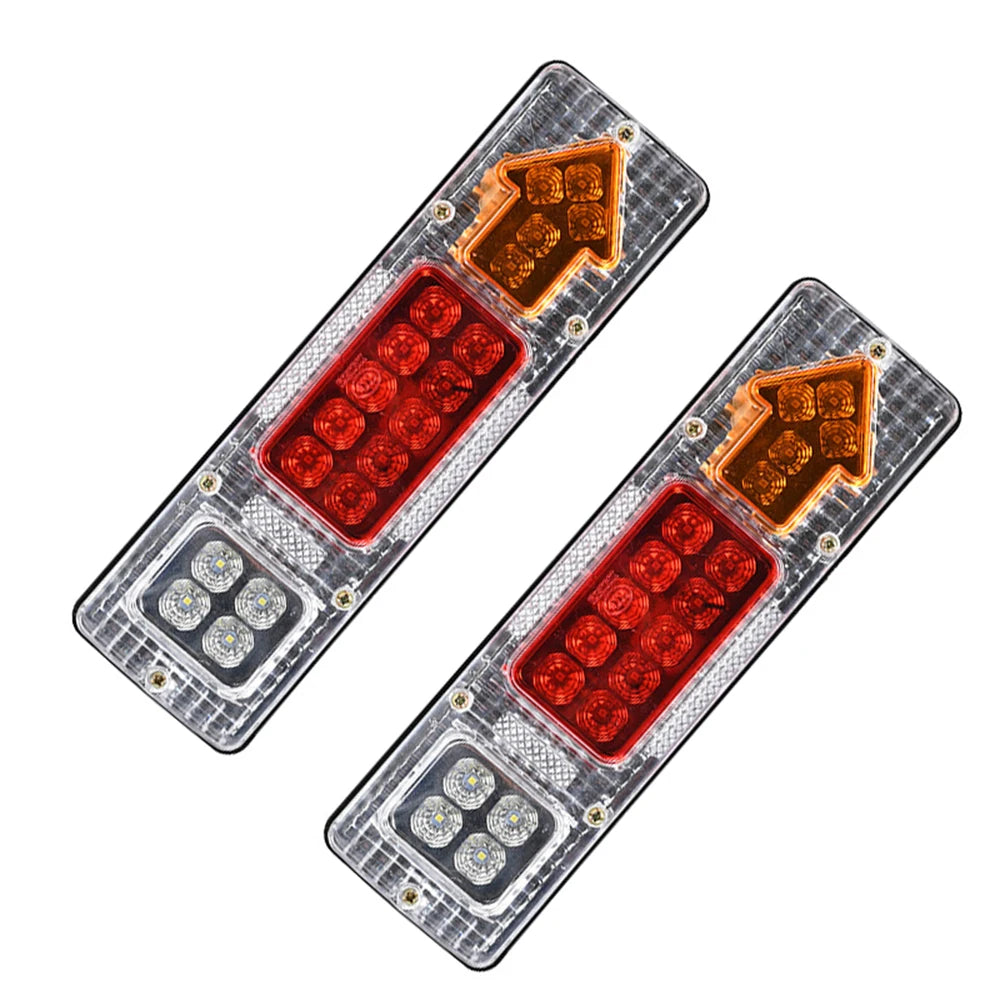 Dual high-brightness truck tail lights with amber and clear lenses for commercial vehicles