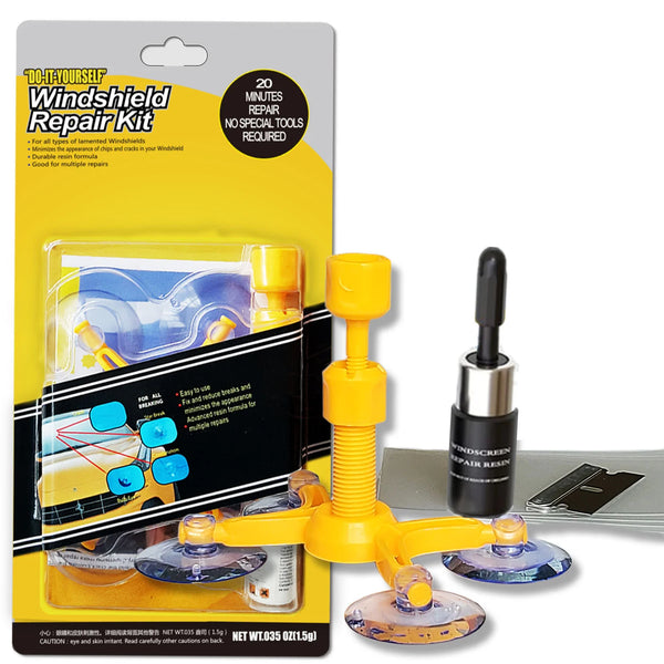 A yellow kit for windshield repair including tools and resin for chips and cracks