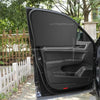A black magnetic car window sunshade is shown open on a vehicle door.