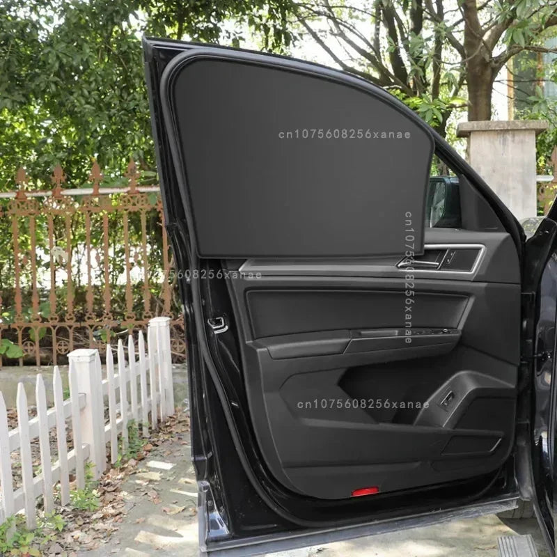A black magnetic car window sunshade is shown open on a vehicle door.