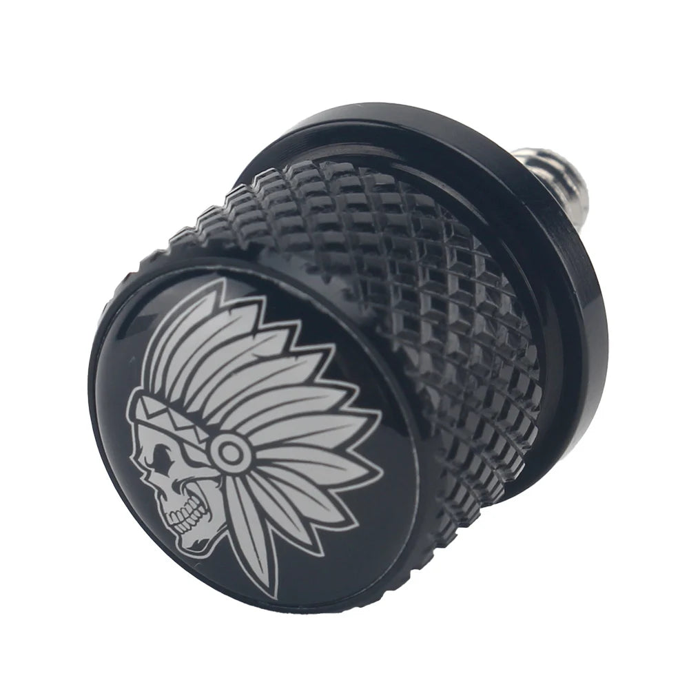 Black aftermarket motorcycle seat and fender bolts with a skull and leaf design