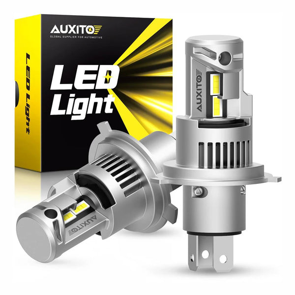 A silver LED light bulb assembly for an automotive headlight, shown next to its packaging box.