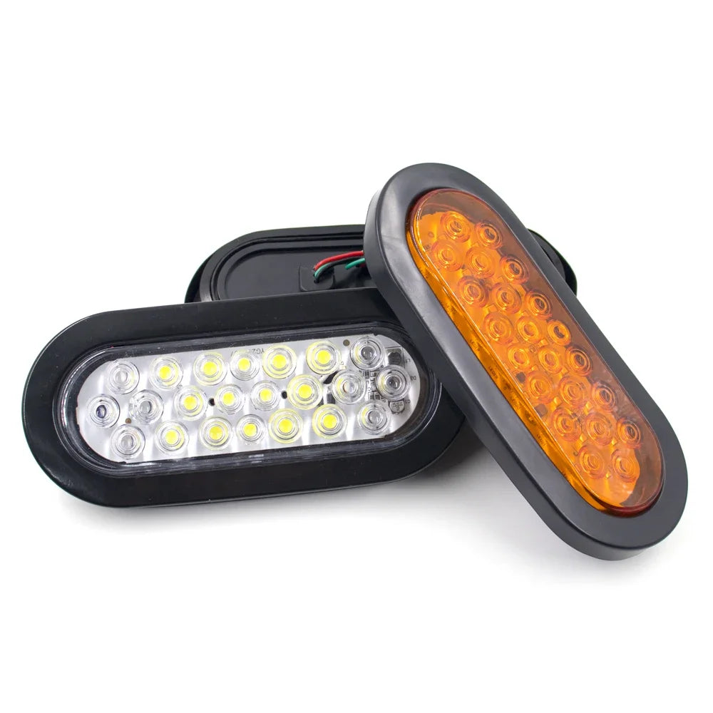 A pair of universal LED brake and marker lights with amber and white lenses mounted on a black housing.