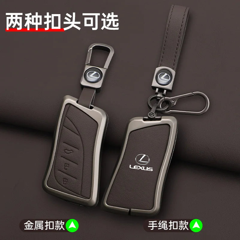 Two Lexus car key covers, one silver and one black, shown with attached lanyards.