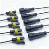 A collection of waterproof electrical connectors with pre-wired leads in black and yellow.
