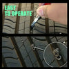 A hand is operating a universal tire puncture repair kit on a rubber tire tread.