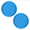 A set of light blue decorative rhinestone car coasters with a honeycomb pattern.