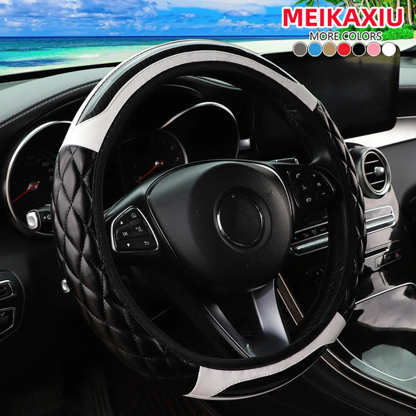 Black leather steering wheel cover with carbon fiber accents and silver trim inside a car