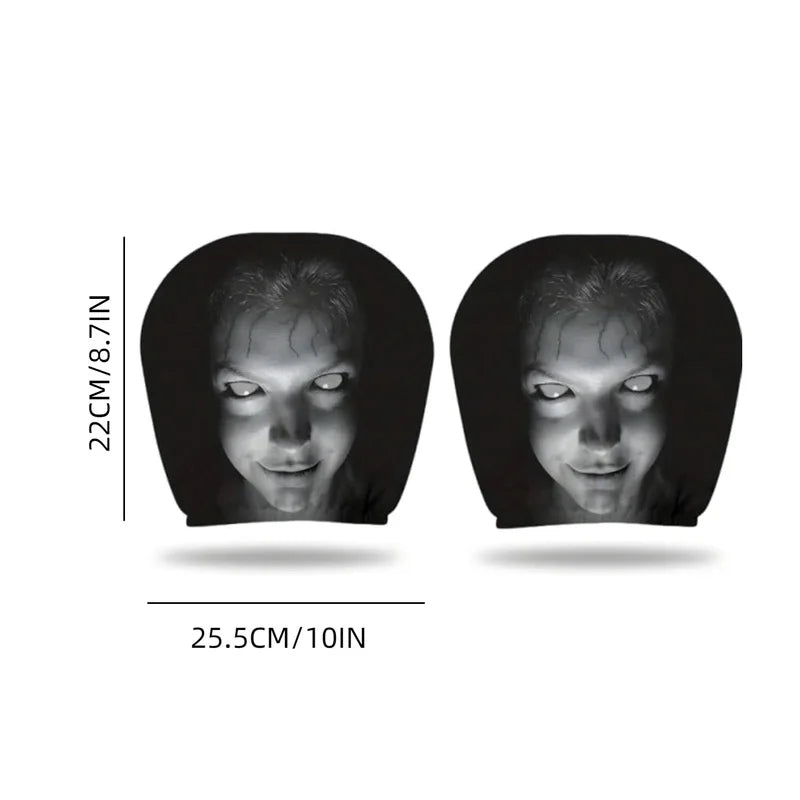 Un par de fundas para la cabeza de Ghostface de color negro para un coche, vista desde el frente.