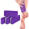 Pieds de verre naturels violets utilisés pour exfolier la peau morte sur un pied.