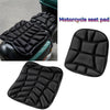 Black motorcycle seat pad with a quilted pattern for enhanced comfort