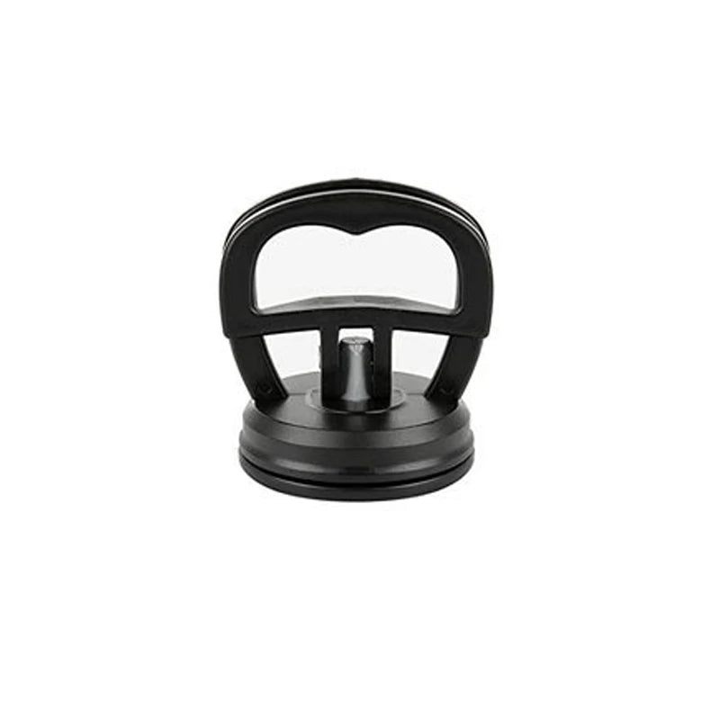 Black car dent remover puller with a suction cup mechanism.