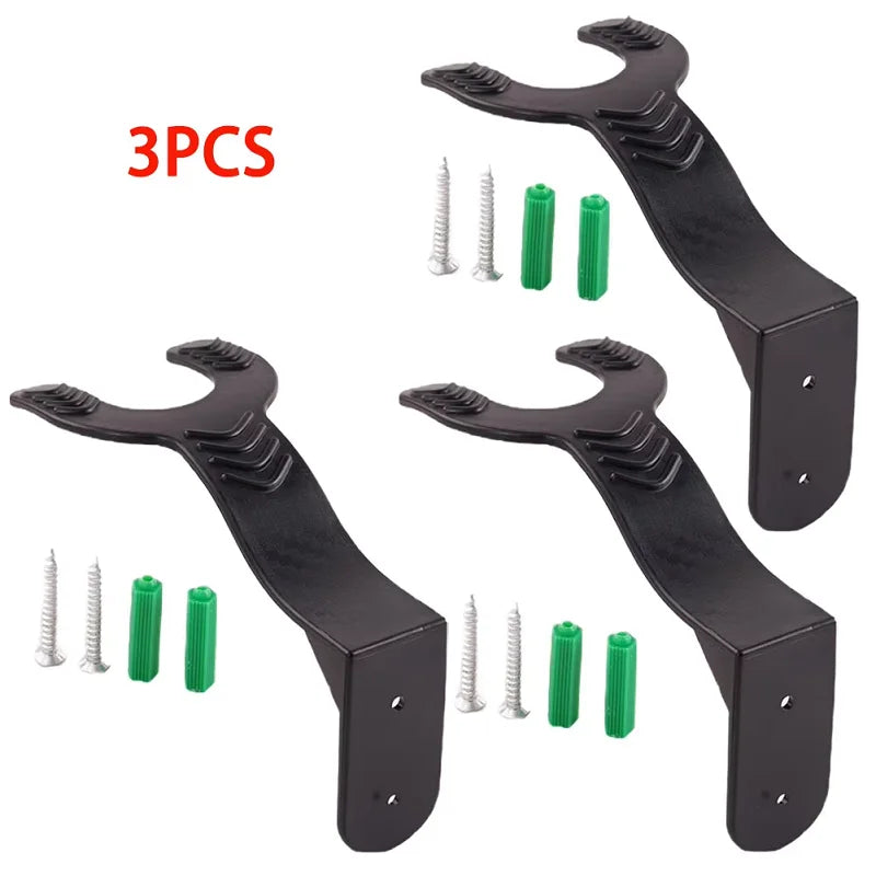 Three black wall mount hooks and six silver and green screws for a multi-sport gear hook.