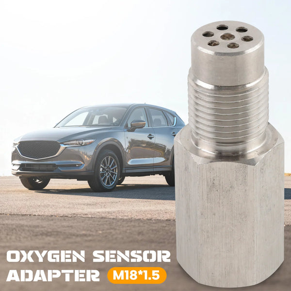 A silver oxygen sensor adapter fitting for vehicle diagnostics, shown next to a Ford Edge SUV.