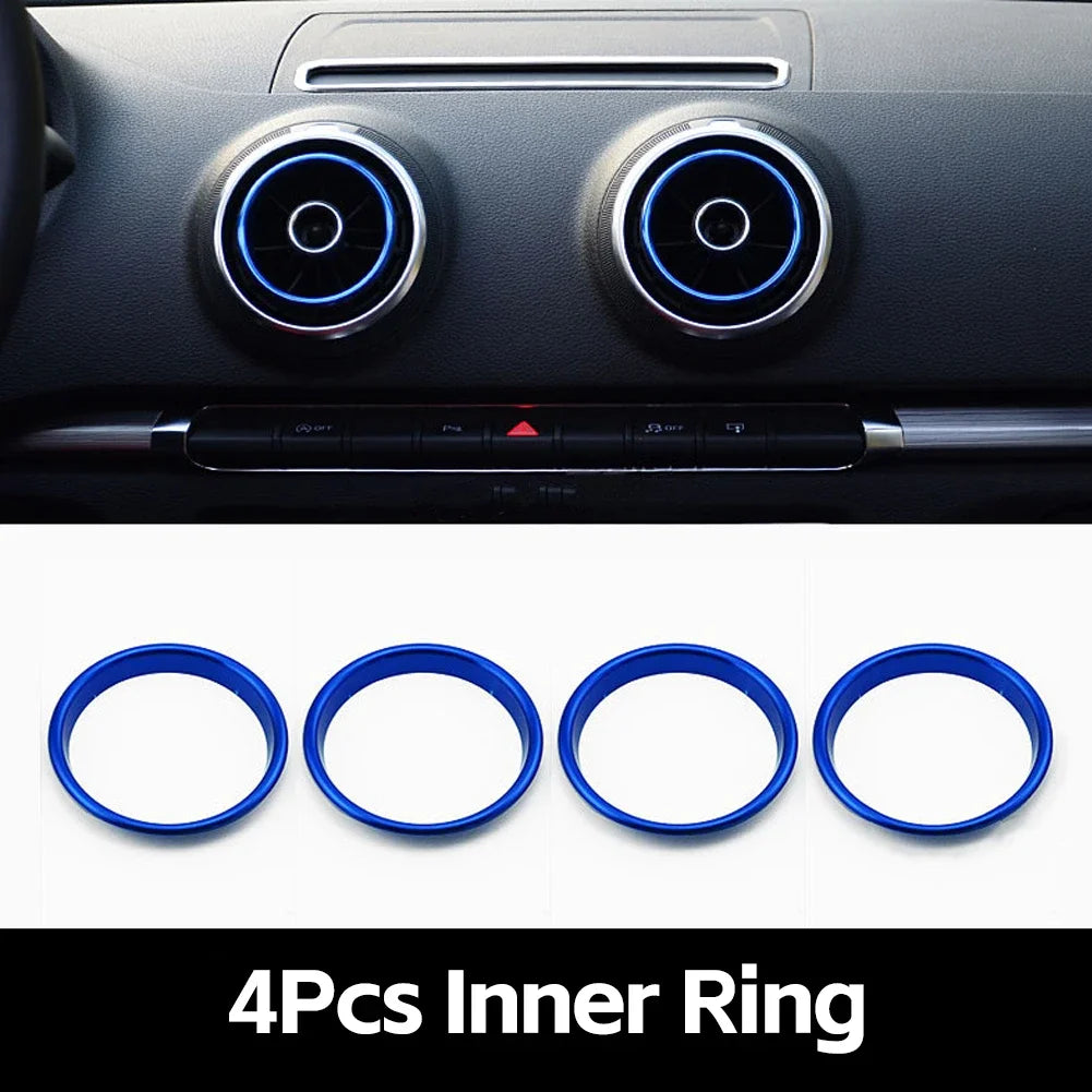 Four blue inner rings used as interior air vent trim covers for an Audi A3