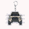 Silver acrylic keychain featuring a detailed model of an off-road truck.