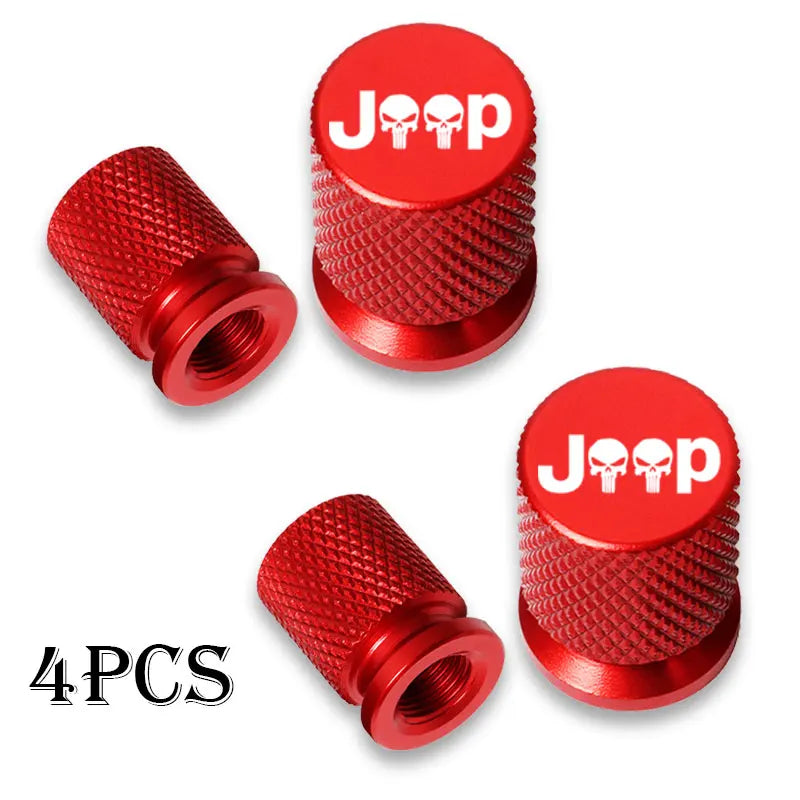 Four red Jeep tire valve caps with skull emblems shown in a product photo.