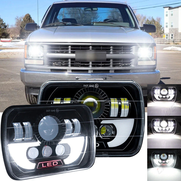 A close-up view of a 7-inch square LED headlight with an integrated turn signal mounted on a truck grille.
