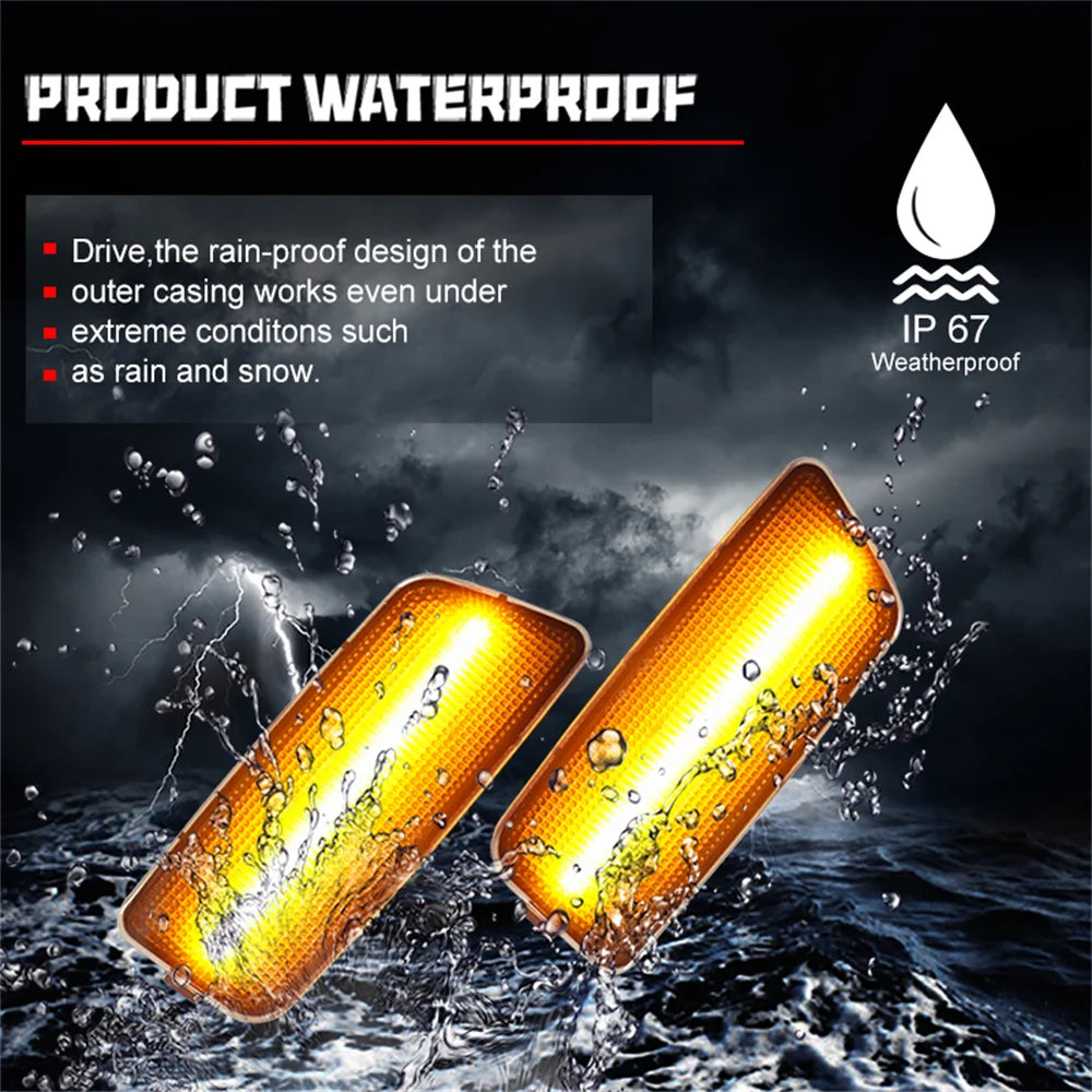 A bright orange LED side marker turn signal is shown being splashed by water.