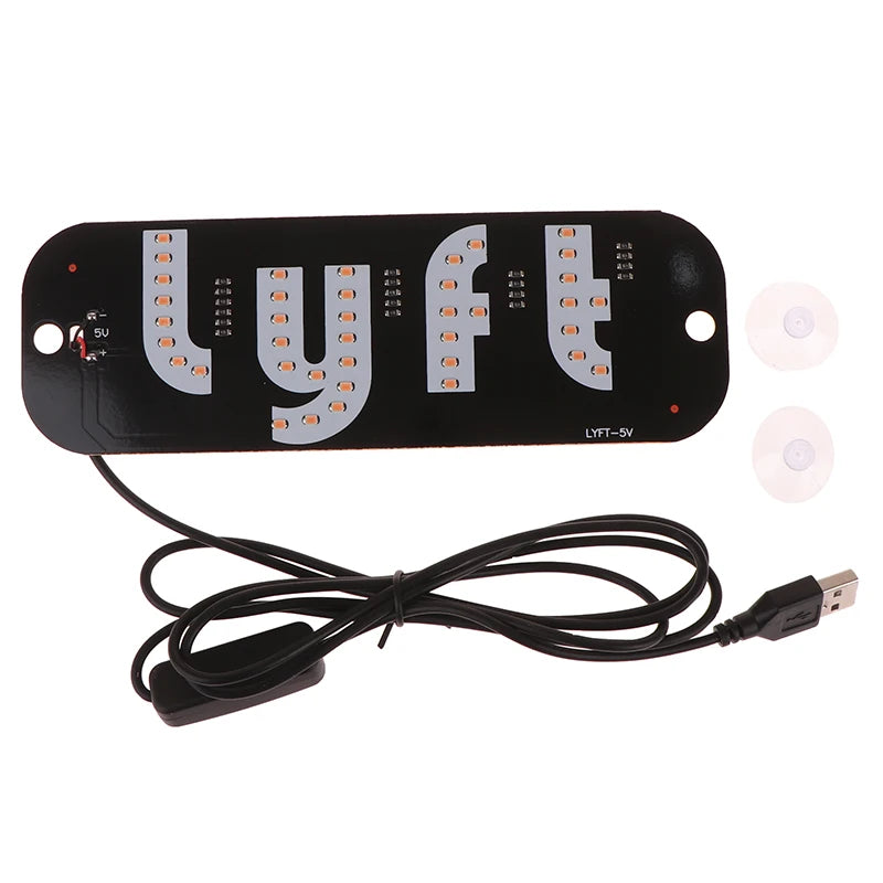 Lámpara de señal de taxi LED negra con las letras LYFT-SV iluminadas en la parte frontal y un cable de conexión.