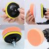A set of orange and black car polishing pads shown in various stages of use.