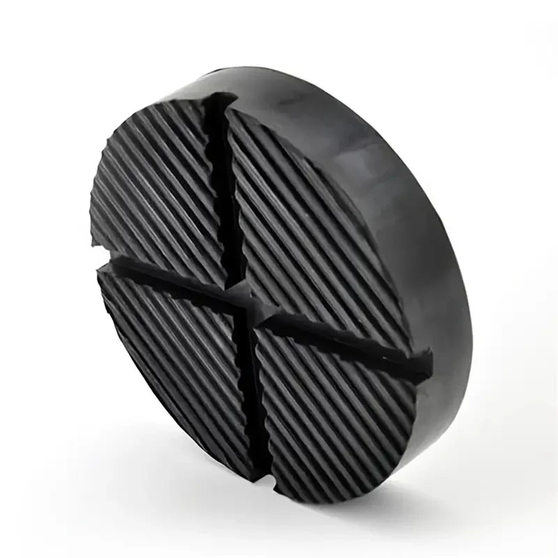 Black car jack point protection pads designed to prevent damage to the undercarriage.