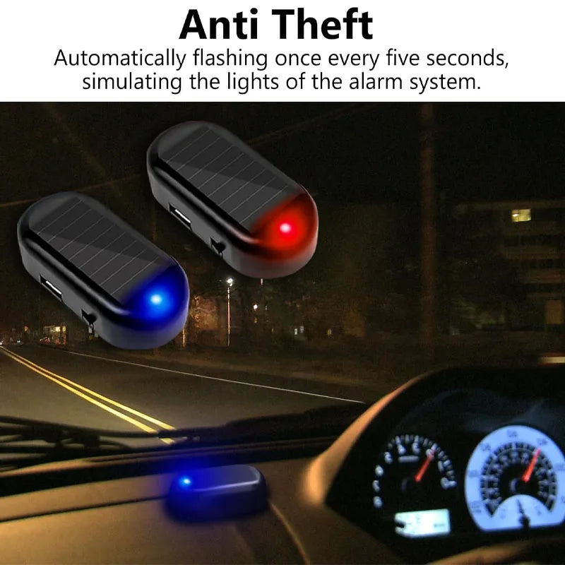 A solar powered anti-theft car warning light flashing red and blue lights on a dashboard.