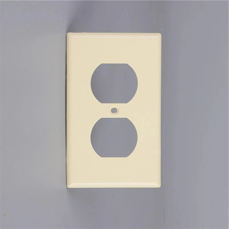 A rectangular, off-white electrical light switch cover plate with two circular openings for switches.