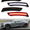 LED turn signal lights installed on a gray sports car, showing various light configurations.