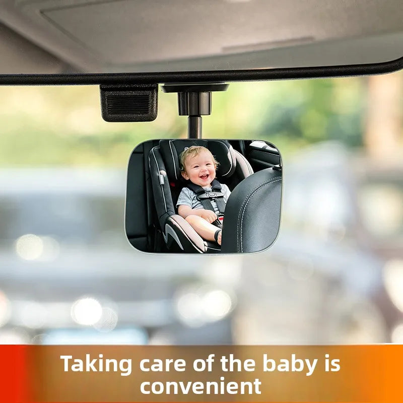 A baby is visible in a car seat reflected in a 360° adjustable car reverse mirror for blind spot assistance.