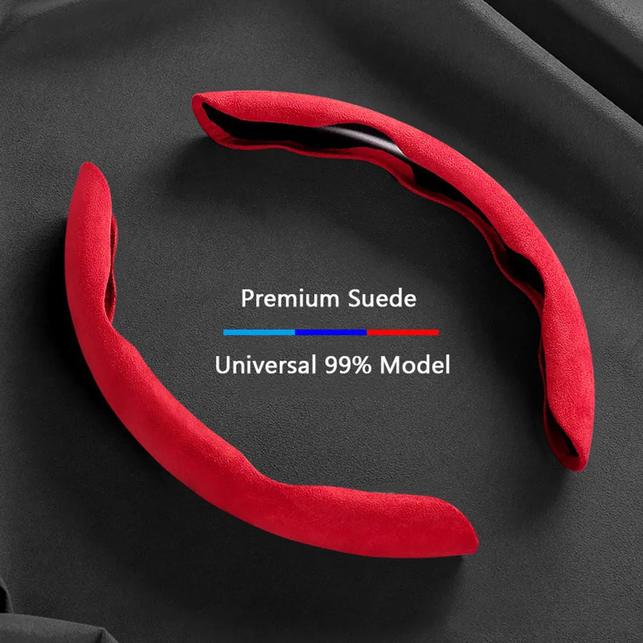A red suede universal model steering wheel cover shown against a black background.