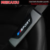 Black and gray PU leather carbon fiber seat belt shoulder guard installed on a car seat.