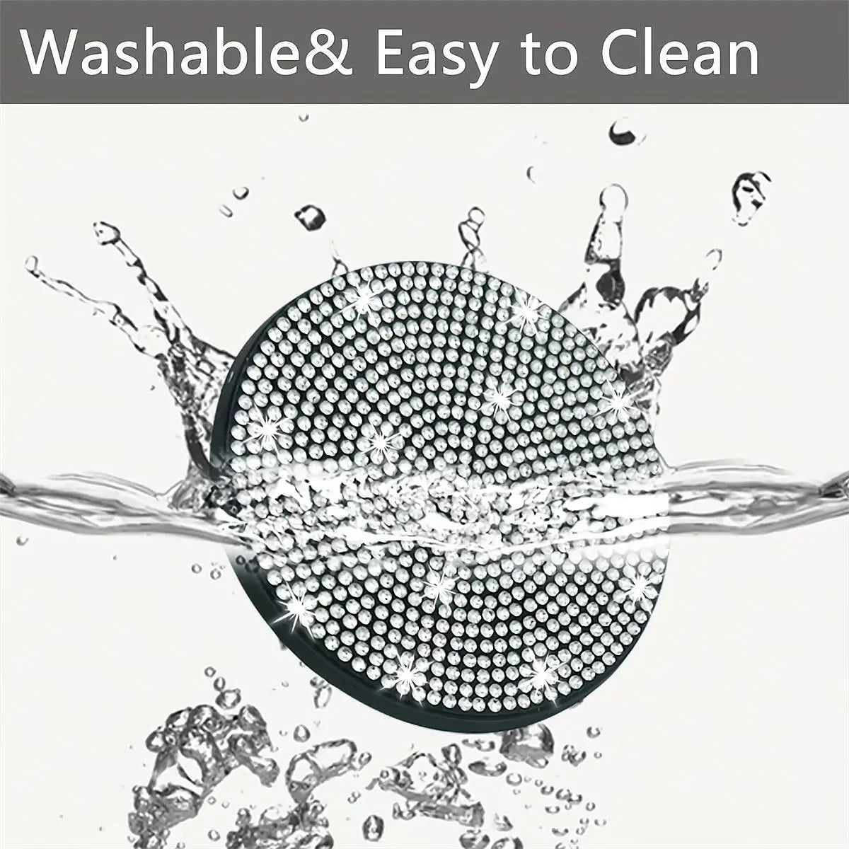 A close-up shot of a black mesh coaster being washed with water, demonstrating its washable and easy to clean feature.