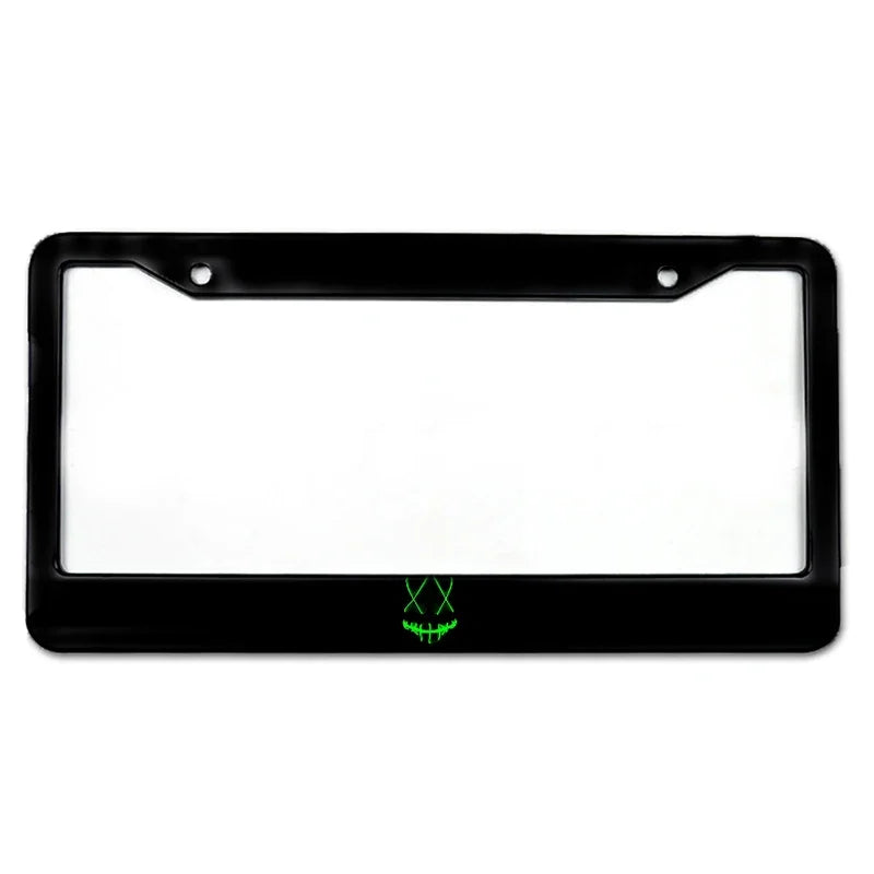 Black aluminum license plate frame with custom lettering on the bottom edge.
