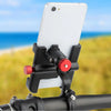 A black adjustable aluminum phone mount is attached to a bicycle handlebar, holding a white smartphone.