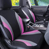 Front seat with pink and gray fabric covers installed in a car interior.