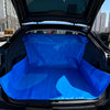Blue waterproof car trunk liner mat installed in the open trunk of a vehicle.