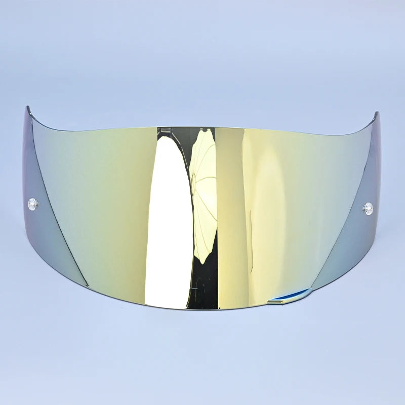 A clear motorcycle helmet visor shield with a gold tint and reflective surface.