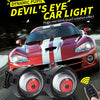 A close-up of a red car with an LED eye light installed, showing the dynamic blink and pupil rotation effect.
