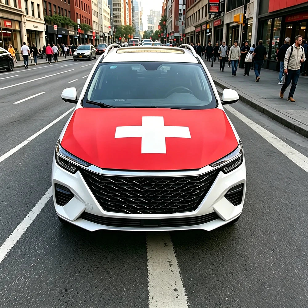 A red and white medical cross flag displayed on the hood of a white car in an urban street setting.