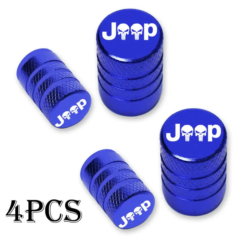 Four blue Jeep branded tire valve caps shown individually.