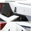 Close-up of a black latch pin securing a car hood, demonstrating easy installation.